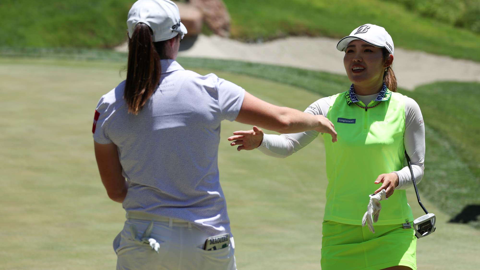 Ayaka Furue of Japan hugs Leona Maguire of Ireland after winning on the 17th hole on day five of the Bank of Hope LPGA Match-Play presented by MGM Rewards