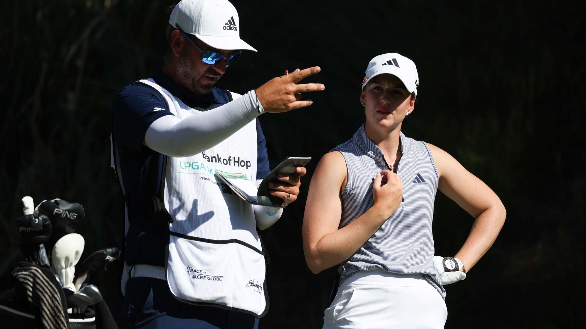 Linn Grant of Sweden and her caddie line up a shot on the eighth tee on day four of the Bank of Hope LPGA Match-Play presented by MGM Rewards